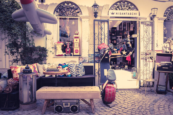 Retro,Vintage View of an antique shop with different kind of objects for sale in Alacati,Turkey.26 August 2017.