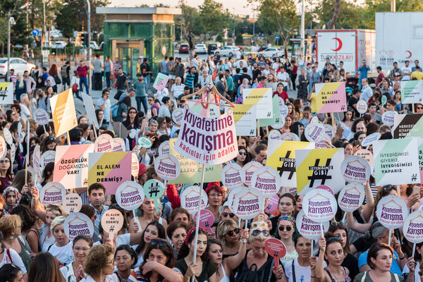 Women Protesters rally in kadikoy against interfering women clothes. Women carry"Do not touch my clothes" banners: TURKEY, ISTANBUL,29 JULY 2017