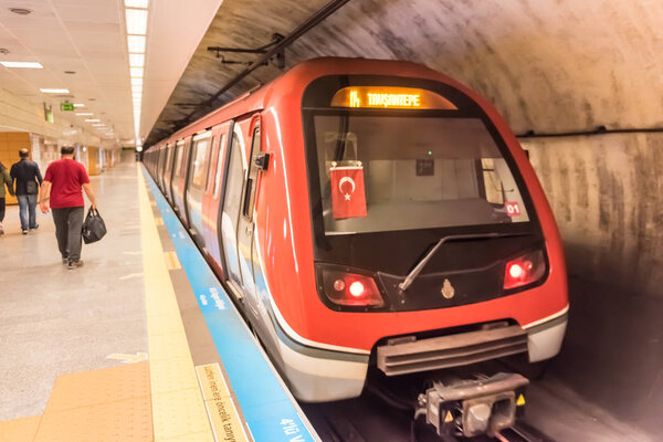 Unidentified wait for Marmaray train in Subway metro.Istanbul,Turkey,28 October 2017