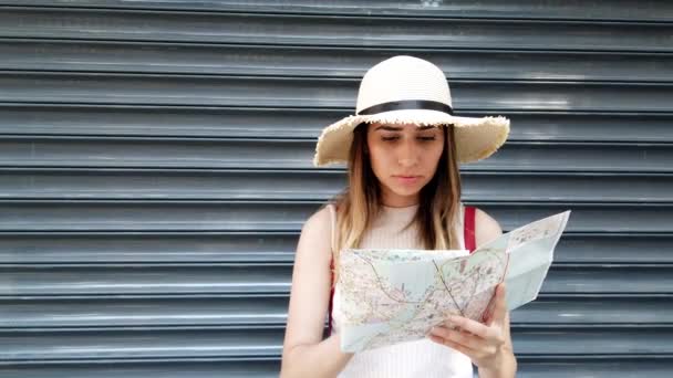 Beautiful Young Girl Looks Map Istanbul Metallic Background — Stock Video