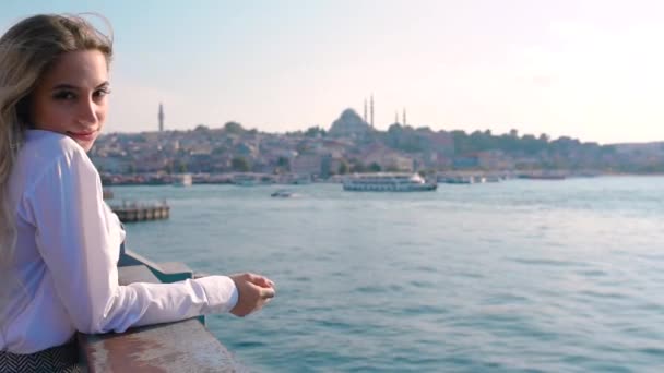 Slow Motion Beautiful Girl Stands Galata Bridge Enjoys View Bosphorus — Stock Video