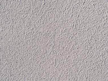 yapısal sıva closeup ile beyaz boyalı duvar / makro güneş ışığı altında