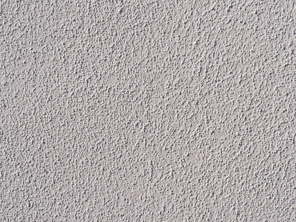 クローズ アップ構造石膏と白い塗装壁 太陽の下でマクロ — ストック写真