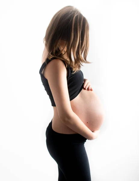 Těhotná Žena Model Dotýká Její Těhotenské Břicho Břicho Izolované Bílém — Stock fotografie