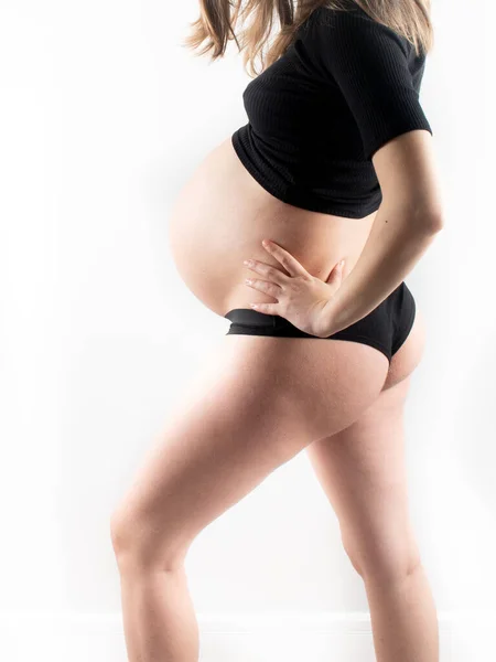 Беременная Модель Касается Живота Беременной Женщины Изолированной Белом Фоне Стройная — стоковое фото