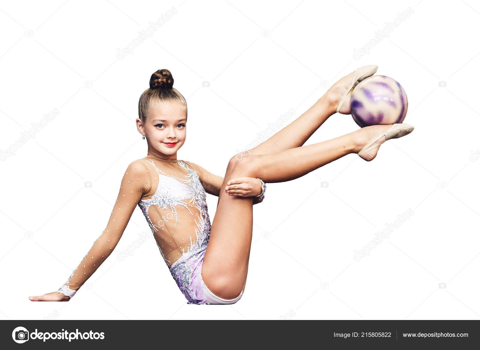 Niña se dedica a la gimnasia rítmica con bola aislada en blanco .:  fotografía de stock © Varnava_photo #215805822