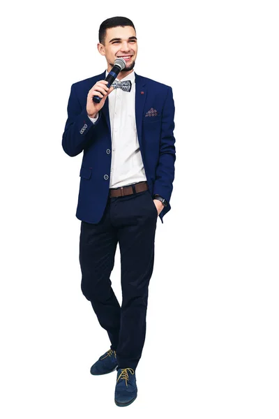 Young stylish man with a microphone in his hand — Stock Photo, Image