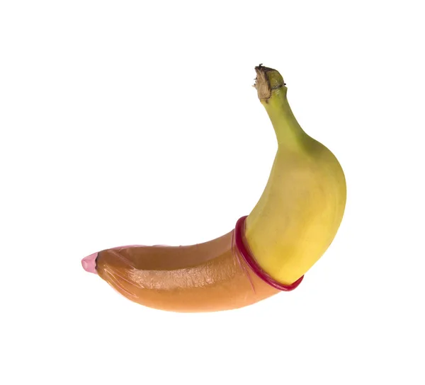 Banane Dans Préservatif Rouge Sur Fond Blanc — Photo