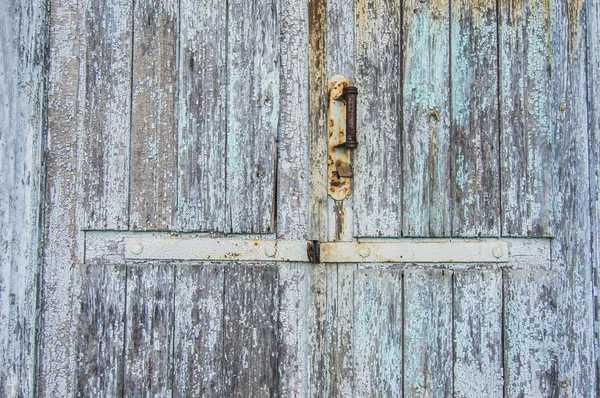 old wooden door, peeling off paint