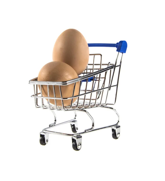 Wózek z supermarketu i jaja — Zdjęcie stockowe