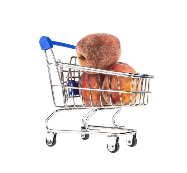Wózek z supermarketu i owoców — Zdjęcie stockowe