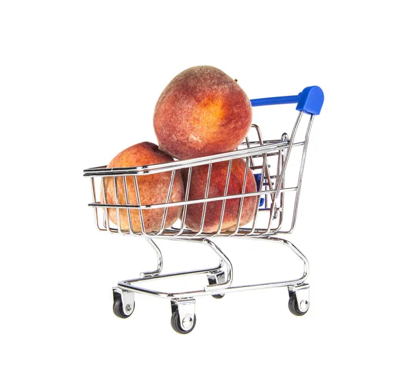 Supermarkt trolley en fruit — Stockfoto