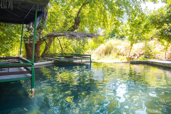 Outdoor homes in the water. A great place to relax and retreat with nature. Such houses are built in Turkey where most days are sunny.