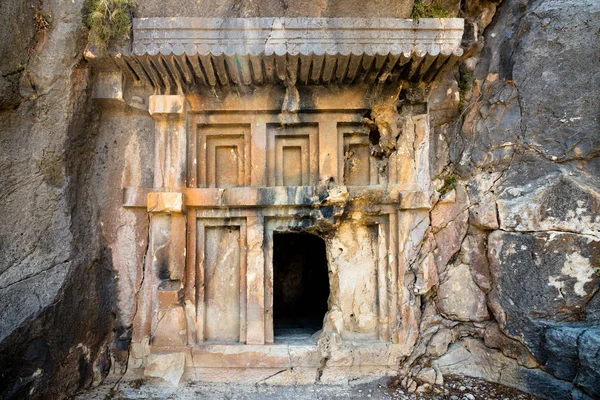 Entrance to the tomb of ancient civilization. Tombs are carved into the rocks on the territory of modern Turkey.