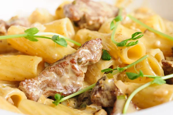 Penne pasta with veal meat — Stock Photo, Image