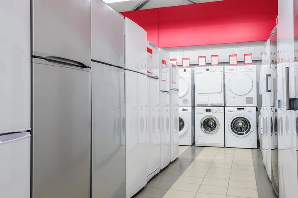 Refrigerators and washing mashines in appliance store — Stock Photo, Image