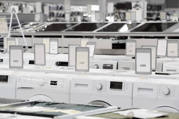 washing mashines in appliance store showroom