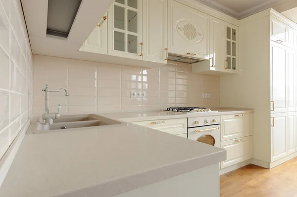 Classic cream colored kitchen close seup — стоковое фото