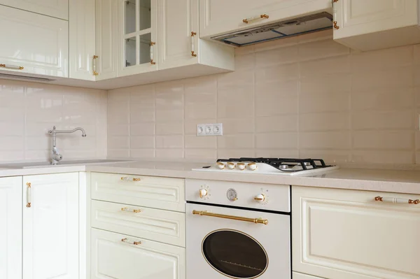 Classic cream colored kitchen close seup — стоковое фото