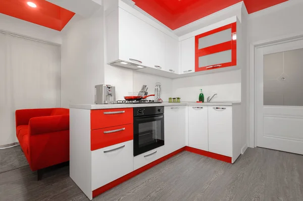 Modern red and white kitchen interior — Stock Photo, Image