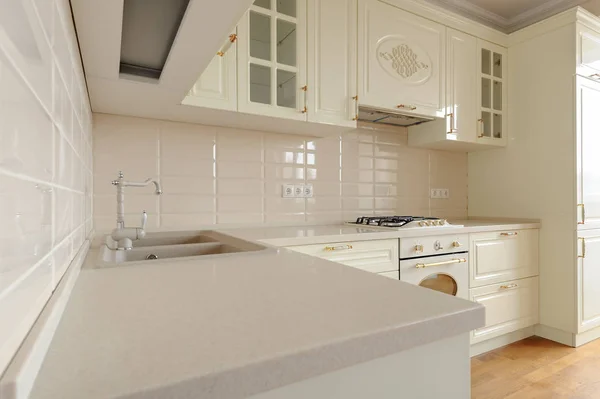 Classic cream colored kitchen close seup — стоковое фото