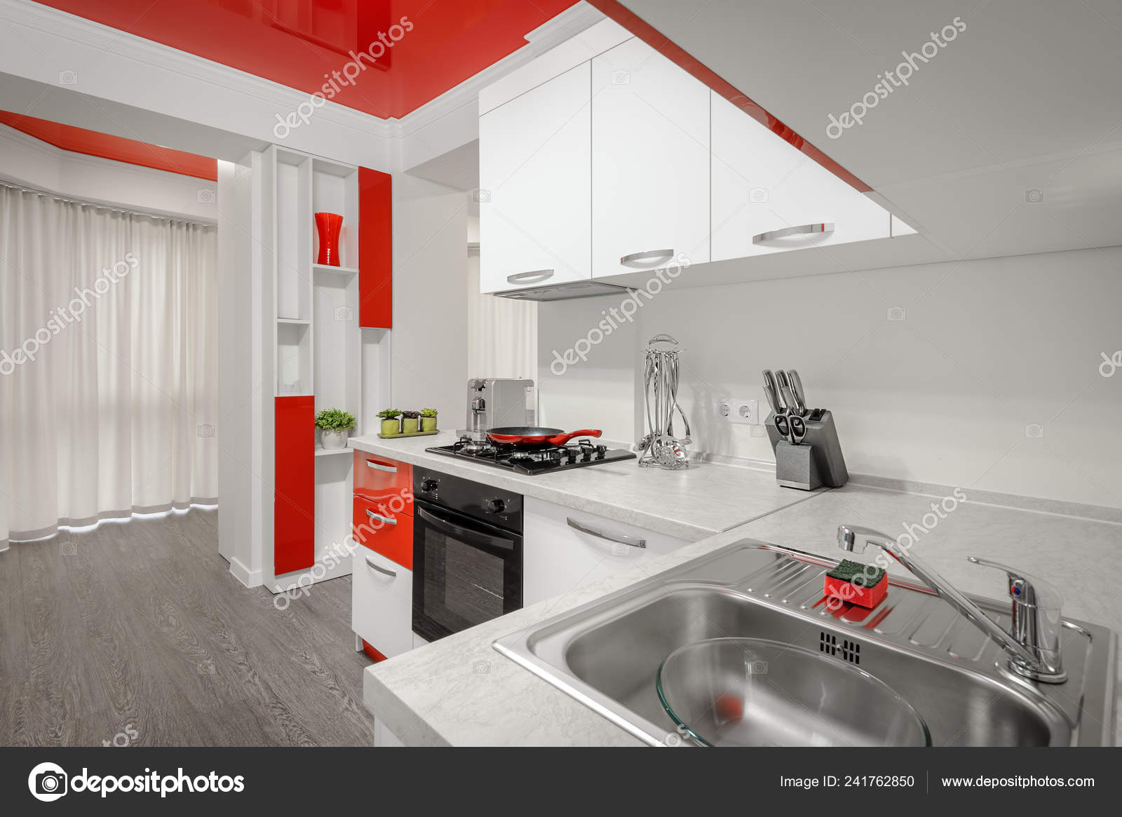 Modern Red And White Kitchen Interior Stock Photo