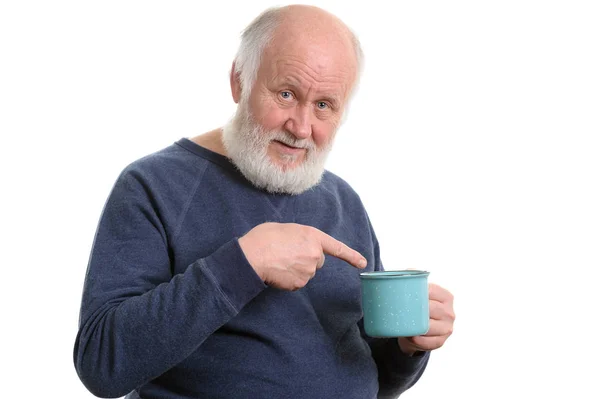 Elderly man with cup of bad tea or coffee isolated on white — Stock Photo, Image