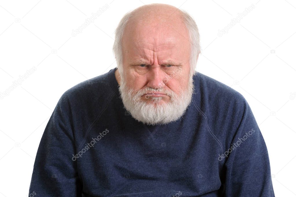 grumpy oldfart or dissatisfied displeased old man isolated portrait