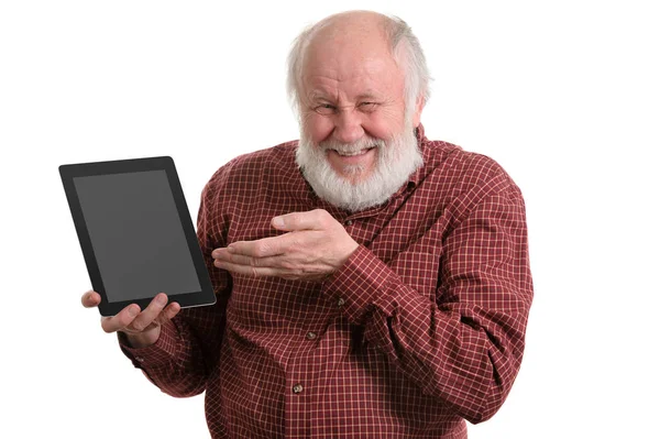 Funny old man using tablet computer isolated on white — Stock Photo, Image