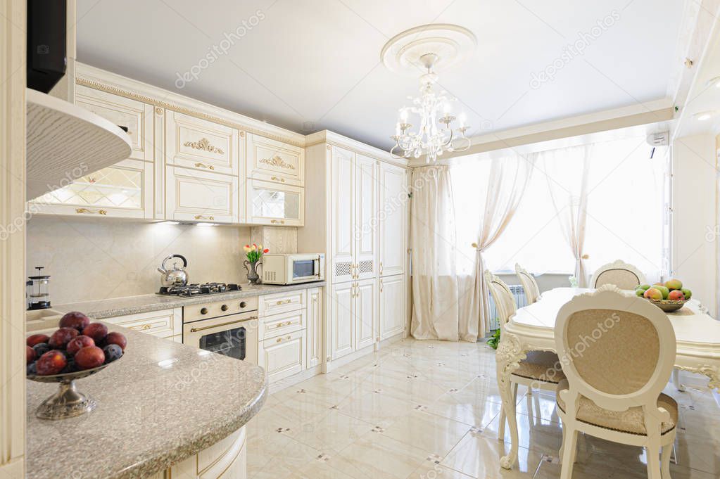 Luxury modern beige and cream colored kitchen interior