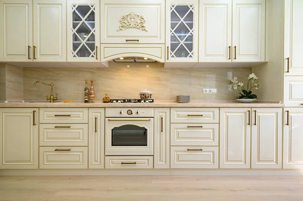 Beige furniture at kitchen in provence style, front view — Stock Photo, Image