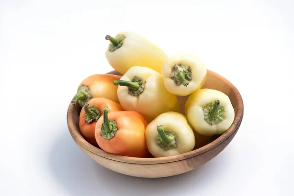 Fresh Raw Peppers Wooden Bowl Ripe Orange Red Peppers Close — Stock Photo, Image