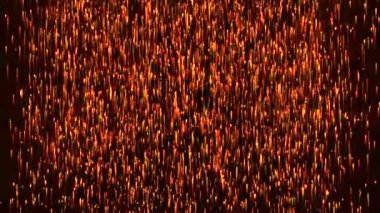 Soyut ateş ışık parçacıkları gidiş / animasyon soyut bir arka plan ile zarif altın ve ışık parçacıkları kadar uçan yangın