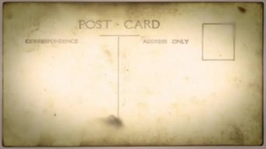 Vintage Kartpostallar Stop Motion Frame Dokulu Loop/4k animasyon grunge sıkıntılı eski kartpostal doku arka planlar, sorunsuz döngü ile vintage hareket grafik