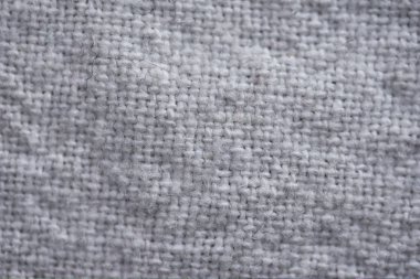 Gri Yün Triko Kumaş dokusu. Closeup kazak, örgü desen arka plan. Kış tasarım. Düz yatıyordu, en iyi görünümü.