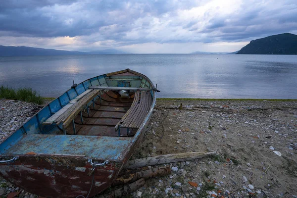 Lake Ohrid landscapes and Boat washed on beach