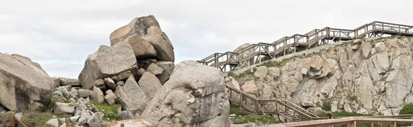 the stairs take tourists to the top of the rocks at Granite Island