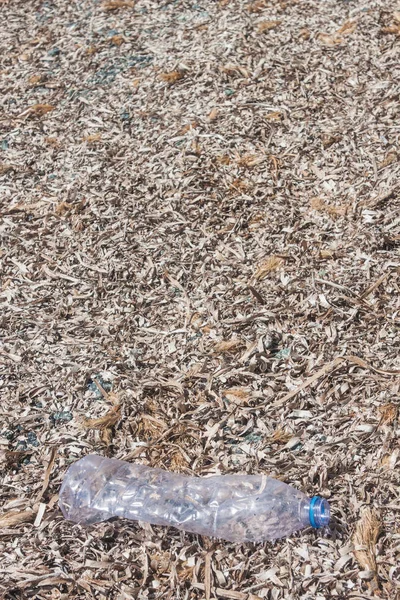 litter plastic bottles in nature