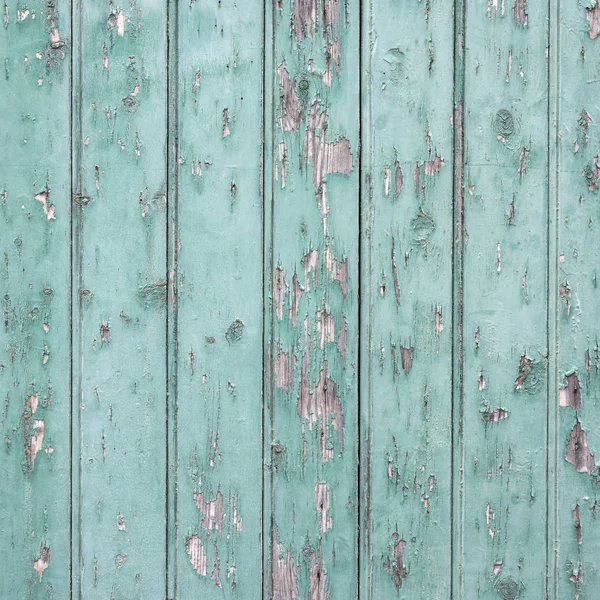 Old blue green door with peeling paint — Stock Photo, Image