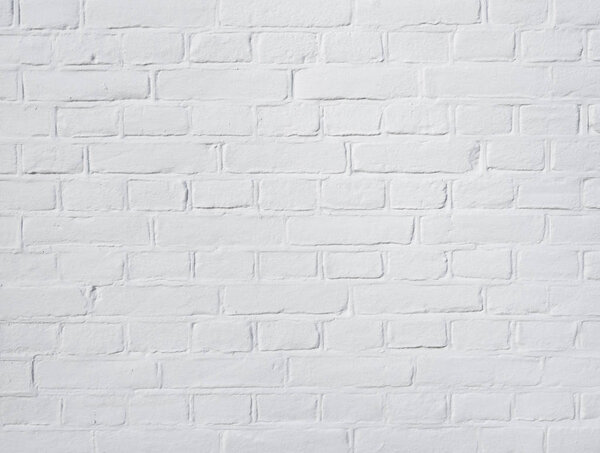 background consisting of horizontal part of white washed brick wall