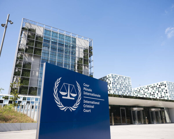 international criminal court in the hague under blue sky in summ