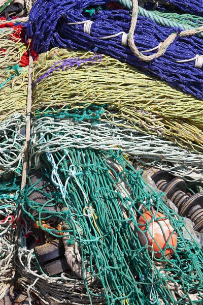 Closeup of colorful fishing nets in harbor — 图库照片