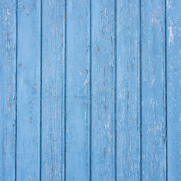 Rachado pintura azul brilhante em tábuas de madeira Fotografia De Stock