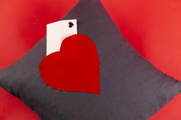 Handmade pillow with a picture of the heart with a card for text