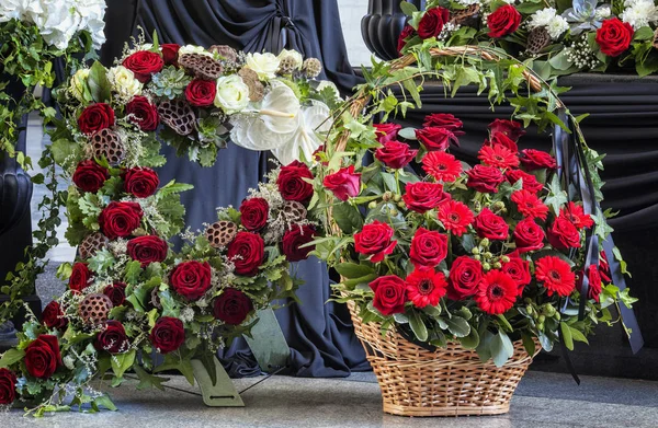 Funeral, beautifully decorated with flower arrangements coffin, close-up