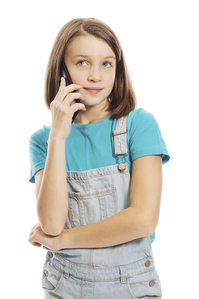 Lächelndes Teenie-Mädchen mit Telefon, Nahaufnahme, isoliert auf weißem Hintergrund — Stockfoto