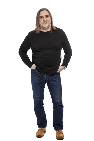 Brutal middle-aged man with long hair, full-length. Isolated on a white background. — Stock Photo, Image