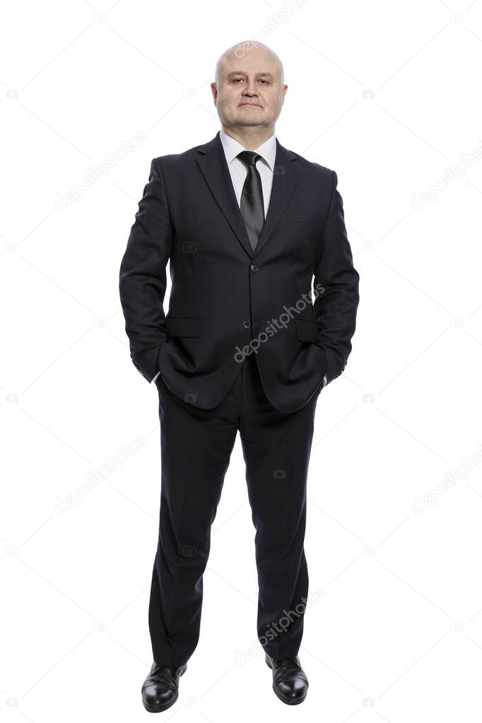 Bald middle-aged man in a suit in full growth. Isolated on a white background.