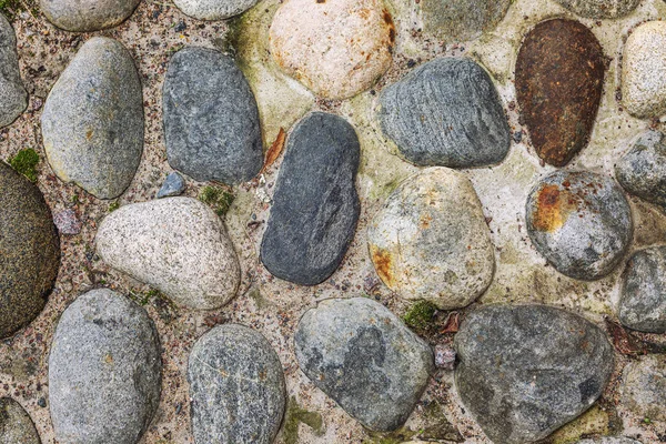 Pavimento de Cobblestone, close-up. Contexto. Espaço para texto . — Fotografia de Stock