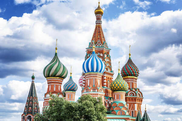 St. Basil's Cathedral on a background of blue cloudy sky. Beautiful city landscape. Horizontal.